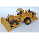 An OHS white metal and diecast model of a Caterpillar 854G wheeled bulldozer