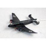 A Dinky Toys pre-war Junkers JU89 Heavy Bomber finished in black with Luftwaffe markings,