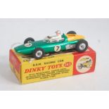 A Dinky Toys No. 243 BRM racing car comprising metallic green body with racing No.