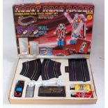 A Robot Road Racer combination game comprising 2 transformer style cars with various track,