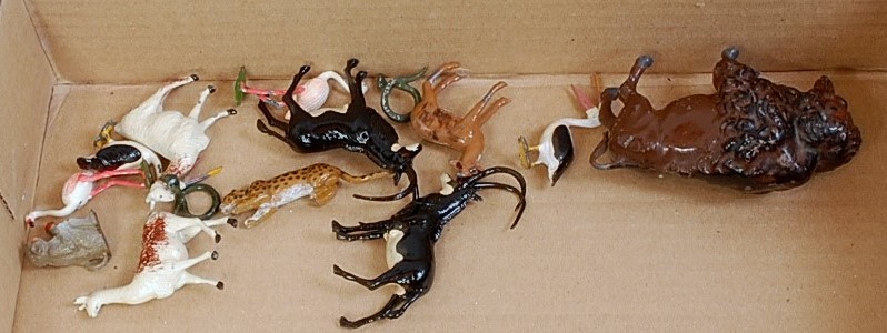 A collection of Britains and other Zoo related figures, 14 examples to include flamingos, cheetah,