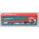 A Tekno 150th scale model of a Scania Vabis 76 truck and articulated covered trailer,