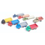 8 various Britains and Minic toys lead and hollow cast vehicles to include a Britains open wagon,