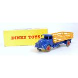 A Dinky Toys 417 Leyland Comet lorry comprising violet blue cab chassis and a yellow back with red