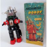 A Nomura of Japan Robbie the Robot comprising tinplate black body with red feed and chrome