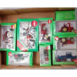 Nine various boxed Siku 1/32 scale farming diecast and implements,