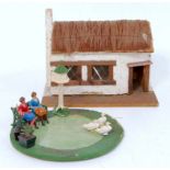 A mixed lot of farm related and civilian wooden and hollow cast figures and accessories to include