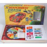 A Matchbox Crash Game comprising four various Superfast diecast vehicles, die and shaker,