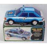 An EGE Spanish tinplate and battery operated Ford Escort XR3 Police car comprising tin printed
