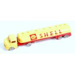 An early Lego plastic Mercedes articulated tanker comprising yellow and red body with Shell livery,