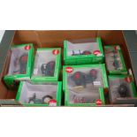 Eight various boxed Siku 1/32 scale tractor and farming implement diecast,