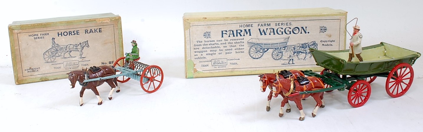 A Britains Home Farm Series boxed farming implement group, to include a re-painted No.