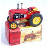A Lincoln International diecast model of a Massey Harris tractor comprising red,