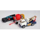 Three various loose Corgi Juniors and Husky diecast miniatures to include a Corgi Rockets Ford