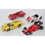 Four various white metal and resin kit built racing and F1 models to include a Scale racing cars