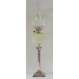A late Victorian silver plated pedestal oil lamp,