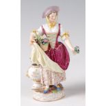 A Meissen Marcolini figure of a flower-seller,