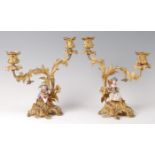 A pair of mid-19th century Rococo Revival gilt bronze two-light candelabra,