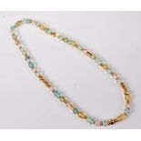 A multi-bead necklace, the multi gemstone pastel coloured bead necklace of varying sizes,