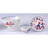 A Lowestoft porcelain tea bowl on stand, together with a slop bowl,