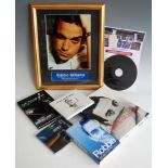 A quantity of Robbie Williams related ephemera, to include signed photograph, CDs, and books,