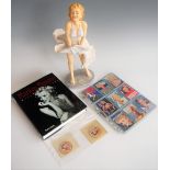 Mixed lot of Marilyn Monroe memorabilia, to include resin cast figurine, Unseen Archives volume,