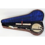 A Charles Skinner 5-string banjo, impressed 'C Skinner 267 Portobello Road' to neck,