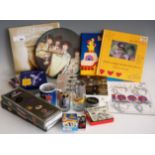Mixed lot of The Beatles ephemera, to include Unseen Archives single volume and other books, mugs,