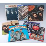 Five Beatles vinyl records, Meet the Beatles, Beatles for sale, A Hard Days Night, Rubber Soul,