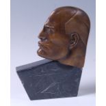 An Art Deco style bronze profile bust of Mussolini, of stylised angular form, mid-brown patina,