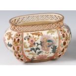 A Zsolnay Pecs glazed ceramic squat vase, of oval shouldered form,