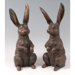A pair of contemporary bronze models of seated rabbits, each with incised detail, unsigned, h.41.