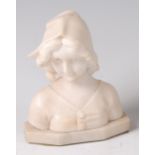 A small Continental Art Nouveau carved alabaster bust of a young girl, wearing a bonnet,