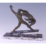 Michel Decoux (1837-1924) - An Art Deco patinated bronze model of a semi-nude warrior fighting off