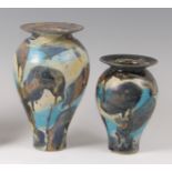 A contemporary studio pottery baluster form vase, having a flattened rim,