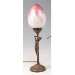 After Moreau - A contemporary bronze table lamp, having a mottled vaseline glass shade,