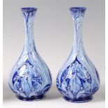 A pair of Moorcroft MacIntyre Florian ware pottery vases, in the Iris pattern,