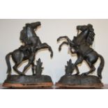 A pair of early 20th century spelter figures of rearing horses,