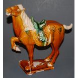 A modern Chinese green and brown glazed figure of a Tang horse, h.