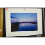 Three framed photograph prints, two signed to the mount Ray Mears,