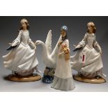 A Lladro porcelain model of a girl in standing pose with outstretched arm and one shoe off,