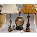 A modern mahogany brass mounted table candlestick, having Corinthian capital and fluted base,