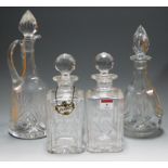 A near-pair of Stuart cut crystal decanters and stoppers,