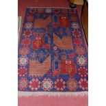 A small Caucasian blue ground rug 152x88cm;