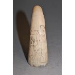 A scrimshaw tooth,