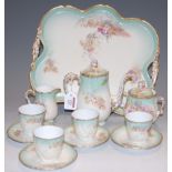 A late 19th century Continental porcelain cabaret set on tray