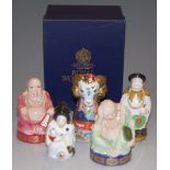 Five various Royal Worcester figural candle-snuffers, to include Mandarin, Smiling Buddha,