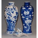 A Chinese export blue and white vase, of baluster form, decorated with birds amongst foliage, having