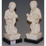 A pair of reproduction Italian writing boy book-ends, h.23cm
