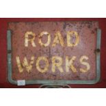 A small collection of assorted enamelled roadwork signs